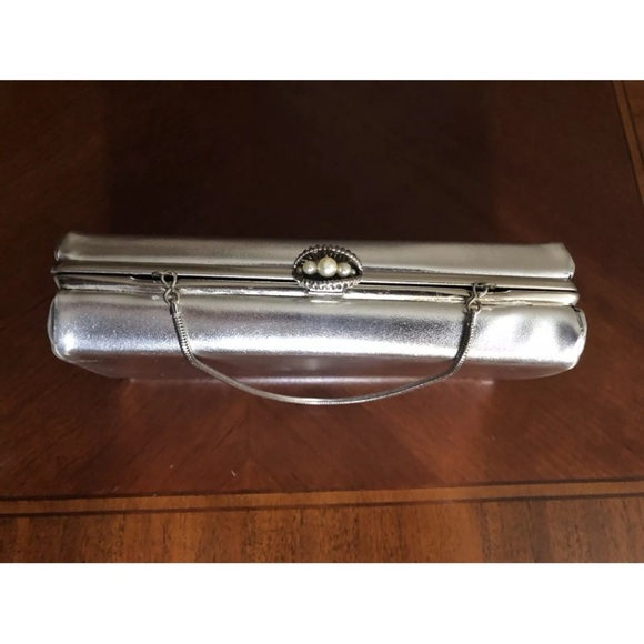 Chic Black Wristlet with Sleek Design and Metallic Accents - Picture 13 of 16